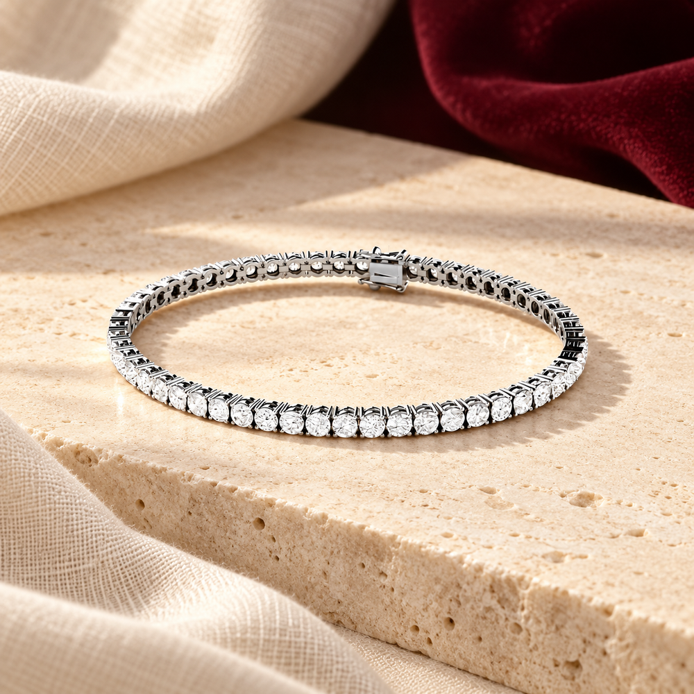 Silver-tone tennis bracelet on ivory stone with burgundy fabric